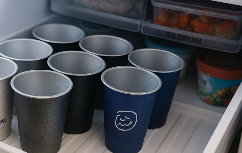 cool efficiency freezer shelf with multiple aluminum cups chilling